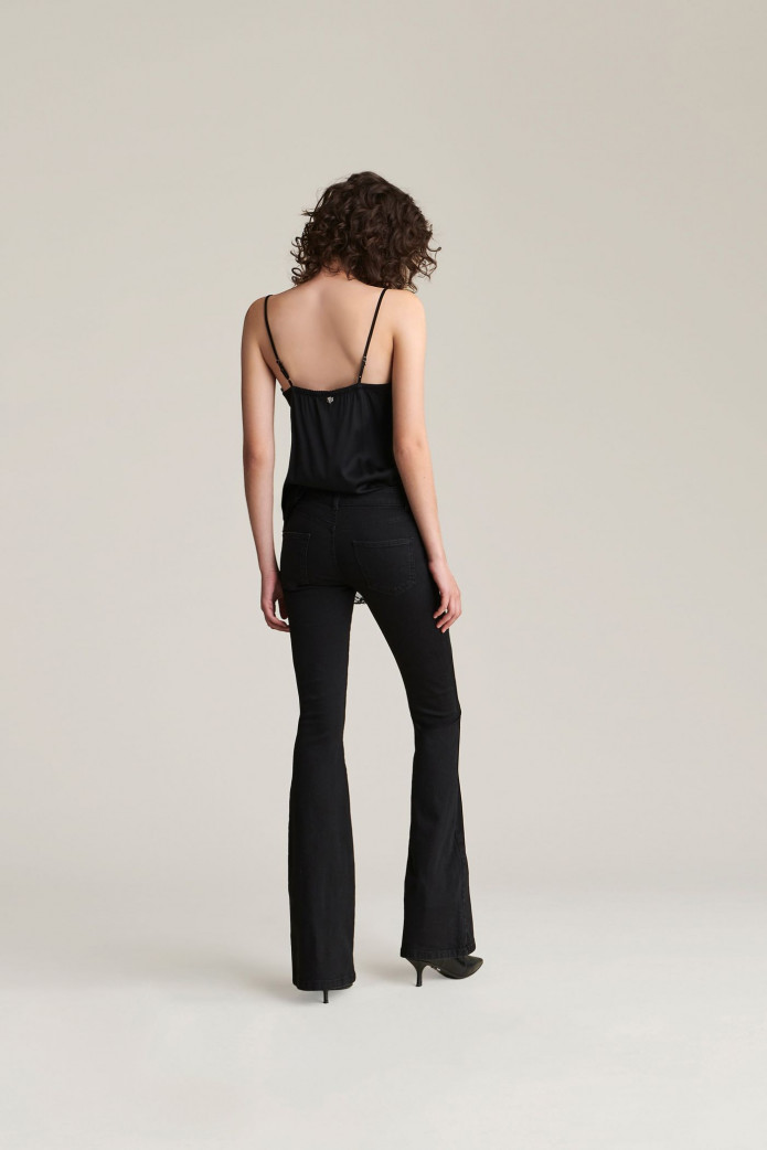 Pantalón flared mechuda Aniye By – Estilo sofisticado con toque setentero
